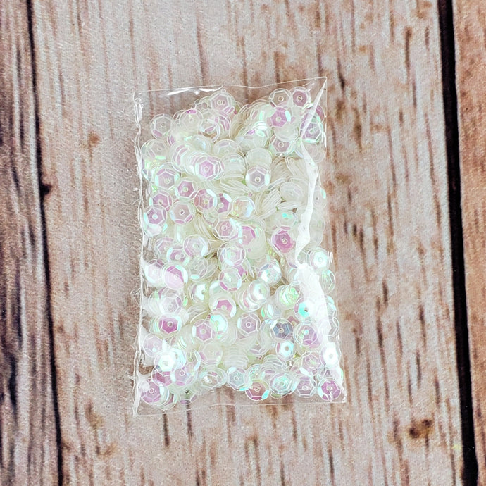 Paillettes iridescentes de 6 mm (12 gr.)