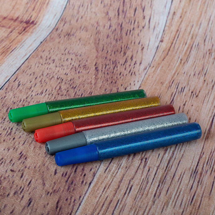 5 petits tubes de colle brillante