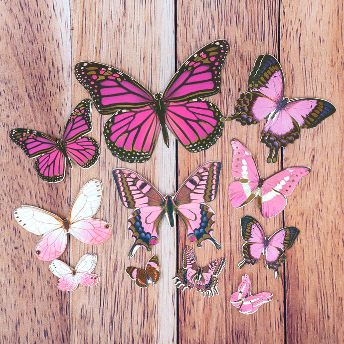 Découpes de papillons roses en carton avec effet doré