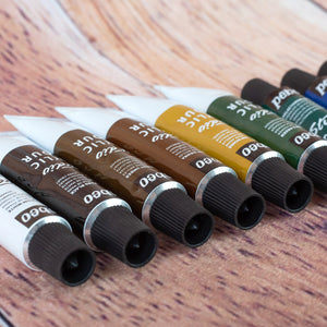 12 petits tubes de peinture acrylique de marque Pébéo