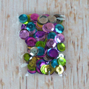 Paillettes multicolores - grosseurs variées (30 gr.)