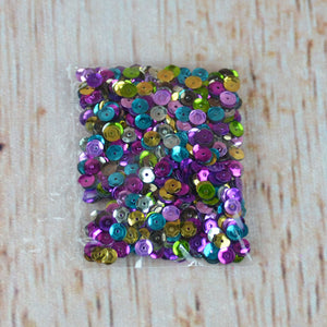 Paillettes multicolores - grosseurs variées (30 gr.)