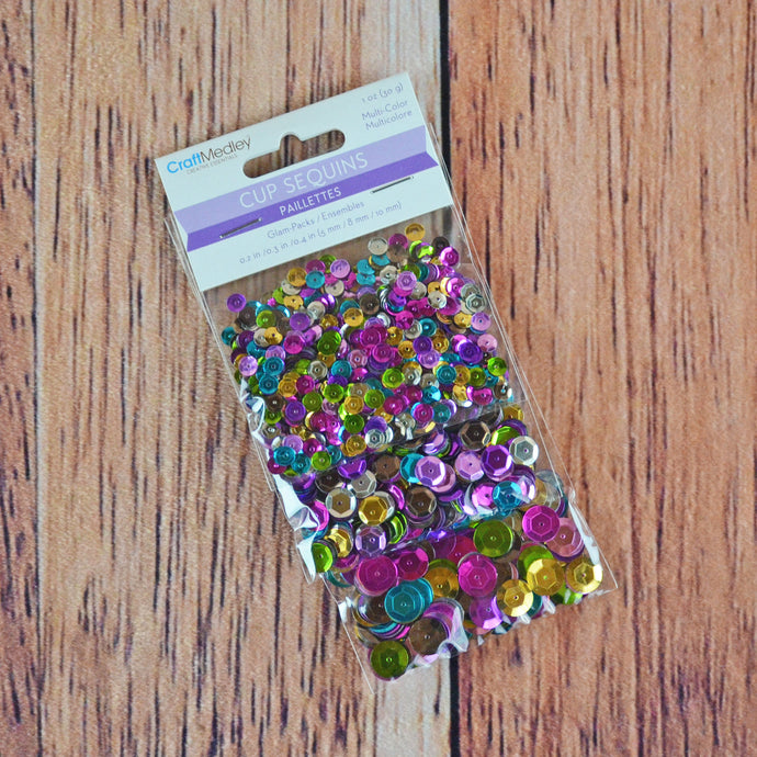 Paillettes multicolores - grosseurs variées (30 gr.)