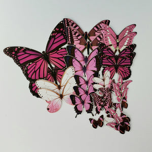 Découpes de papillons roses en carton avec effet doré